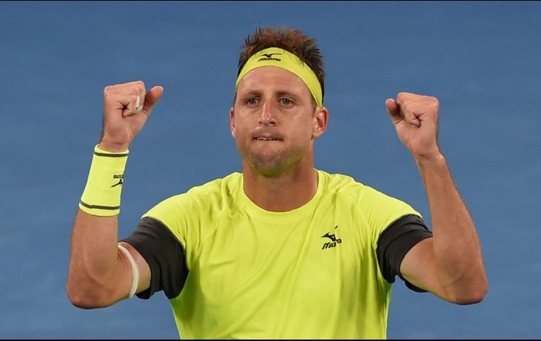 Tennys Sandgren celebra una vez culminado el partido. AFP/G. Wood