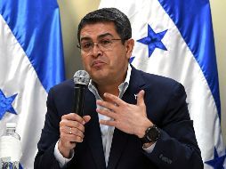 Según la autoridad electoral hondureña, Hernández (foto) ganó las elecciones con el 42.95 por ciento de los votos, frente al 41.42 por ciento de Salvador Nasralla. AFP / O. Sierra