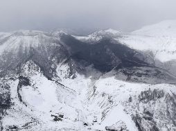 Las autoridades del país asiático tratan de esclarecer si la explosión en el volcán pudo desencadenar la avalancha. AP / S. Takekuma