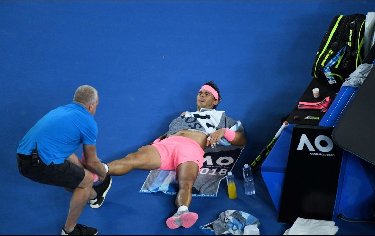 El español abandonó su encuentro de Cuartos de Final en el Abierto de Australia ante el croata Marin Cilic, todo esto a causa de molestias en el muslo derecho. AFP/S. Khan