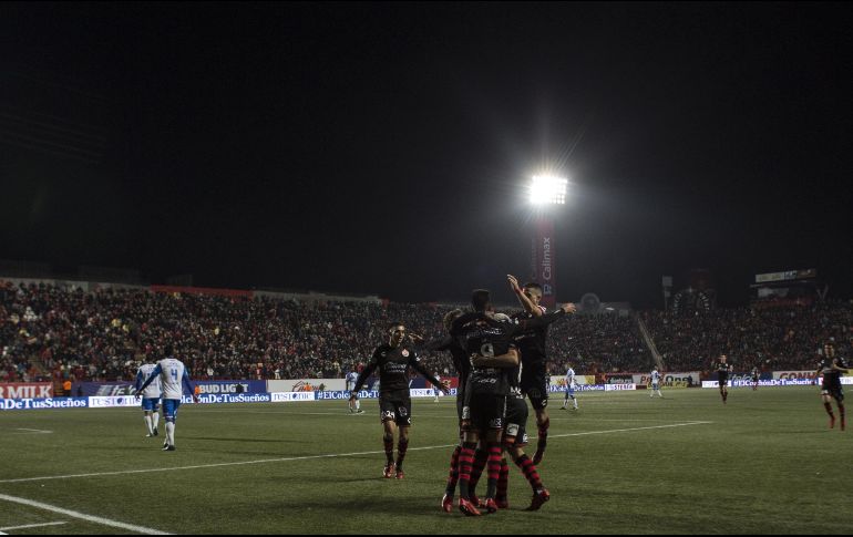 Gustavo Bou y Juan Lucero hicieron los goles del partido. AFP/G. Arias