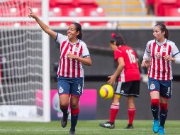 Arletto Tovar (I) celebra tras convertir un penal cometido sobre Brenda Viramontes (D). MEXSPORT/C. de Marchena