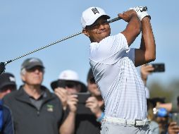 Insatisfecho. Tiger Woods se sintió incómodo por lapsos en la tercera ronda del Farmers Insurance Open. AFP/D. Miralle