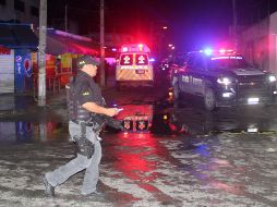 Policías ministeriales resguardan la zona, en lo que autoridades realizan las investigaciones correspondientes. EFE/A. Capul