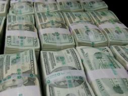 Banco Base prevé que el peso mexicano se ubique entre 18.50 y 18.70 pesos por dólar. EL INFORMADOR / ARCHVO