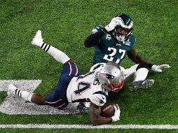 Este es el encontronazo entre Cooks y Jenkins que provoca la salida del jugador de Nueva Inglaterra. AFP/H. Foslien