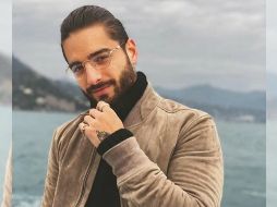 Maluma salió al balcón de su habitación para saludar a todos sus fans, por lo que causó un alboroto entre las personas que estaban cerca. INSTAGRAM / maluma