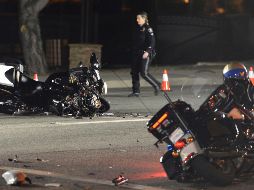 El policía de tránsito que fue impactado por el vehículo fue trasladado a un hospital para recibir atención médica. AP/ R. Remiorz