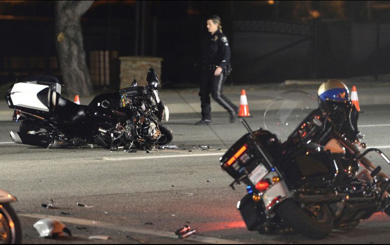 El policía de tránsito que fue impactado por el vehículo fue trasladado a un hospital para recibir atención médica. AP/ R. Remiorz