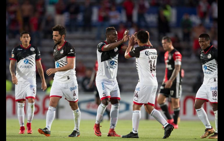 Con un maravilloso tiro libre fuera del área, Quiñones logró firmar la victoria para los Lobos. MEXSPORT