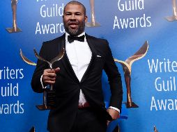 El director Jordan Peele subió al escenario a recoger el galardón a Mejor guión original por 
