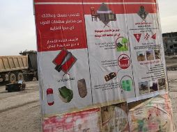 Un cartel informativo alerta sobre los riesgos de las minas, y brinda instrucciones para identificar estos explosivos. ESPECIAL/HRW