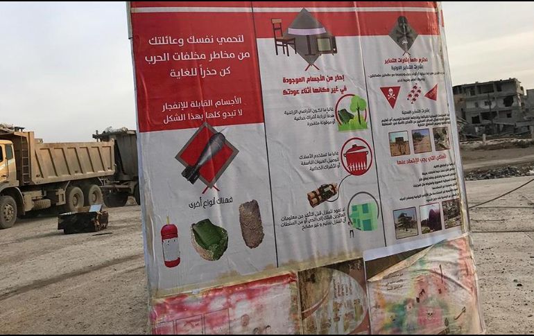 Un cartel informativo alerta sobre los riesgos de las minas, y brinda instrucciones para identificar estos explosivos. ESPECIAL/HRW