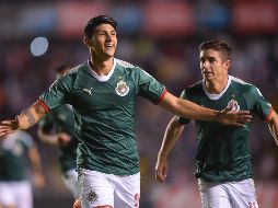 Pulido celebra el primero de los dos goles que anotó esta noche con el Rebaño. MEXSPORT/I. Ortiz