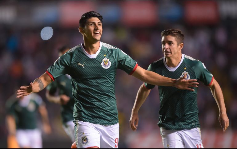 Pulido celebra el primero de los dos goles que anotó esta noche con el Rebaño. MEXSPORT/I. Ortiz
