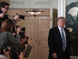 Ante la declaración el mandatario evita hacer cualquier referencia a la legislación vigente sobre acceso a armas de fuego. AFP / J. Watson