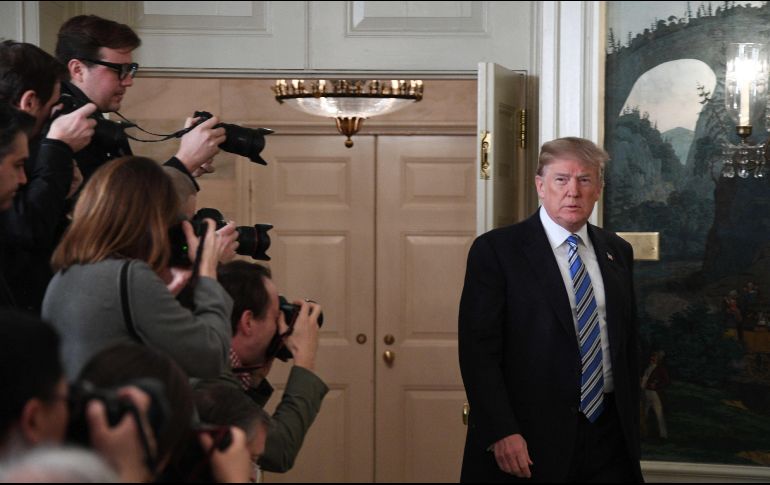 Ante la declaración el mandatario evita hacer cualquier referencia a la legislación vigente sobre acceso a armas de fuego. AFP / J. Watson