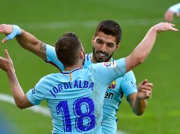 Los goles de Luis Suárez al minuto 16 y Jordi Alba al 88 fueron suficientes para sumar un triunfo que los afianza en la cima general de la competencia. AFP / A. Gillenea