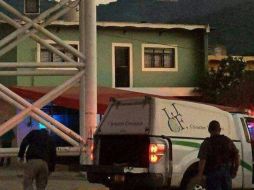 Policías de Tlajomulco acordonaron el lugar en espera de personal del Semefo para realizar el levantamiento del cuerpo. ESPECIAL/ARCHIVO