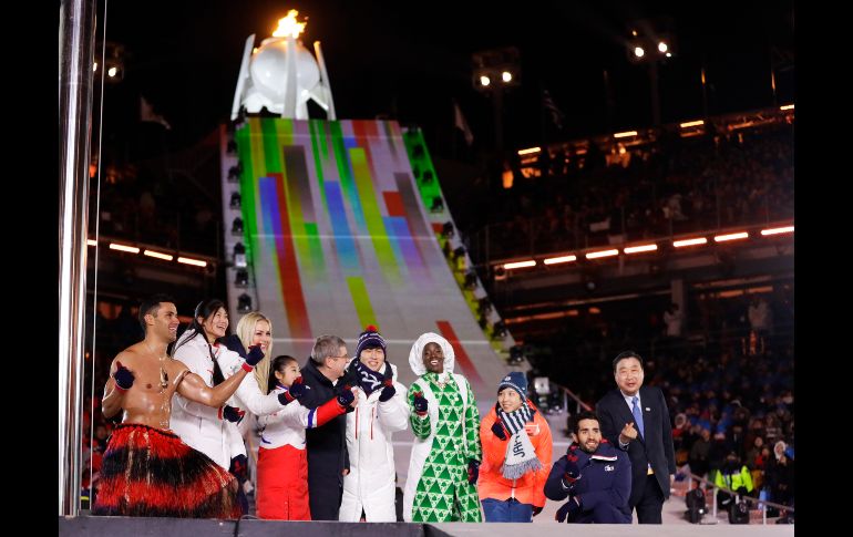 Deportistas de varios países posan juntos. AP/K. Wigglesworth