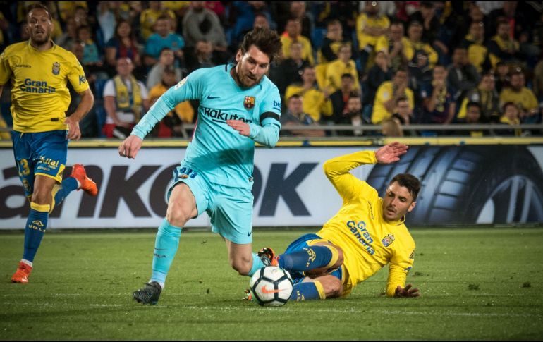 Messi anota para los catalanes al minuto 21, pero los locales igualan con gol de Calleri al 48'. AFP/D. Martin