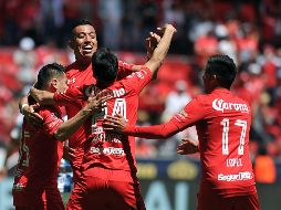 Alegría en el infierno. Los Diablos celebran el primer gol de la tarde, anotado por Uribe al 32'. AFP/R. Vázquez