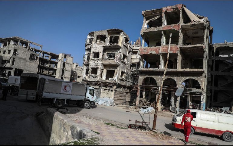 El convoy estaba compuesto por 46 camiones que transportaban comida y material de asistencia médica. EFE/M. Badra