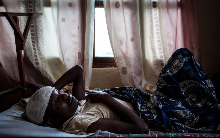 Un hombre, que resultó lesionado en los hechos, se recupera en un hospital de Bunia. AFP/J. Wessels