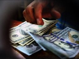 Banco BASE estima que el tipo de cambio se cotiza entre 18.66 y 18.90 pesos . EL INFORMADOR / ARCHIVO