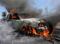 Estas acciones se suman a la quema de alrededor de 30 vehículos de uso particular y comercial, además de otros ataques a tiendas de autoservicio y de conveniencia. EFE / I. Villanueva