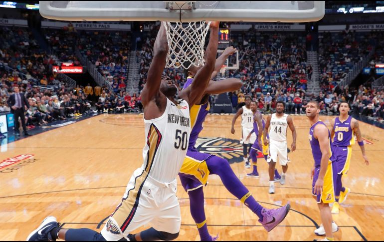 Rondo y Anthony Davis se combinaron para 57 tantos (23/38 en el tiro), 11 rebotes y 11 pases decisivos. AP / G. Herbert