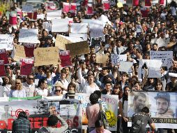 Alumnos de la Universidad de Medios Audiovisuales CAAV marcharon para exigir la localización de sus tres compañeros. EL INFORMADOR/G. Gallo