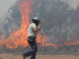 Las líneas para reportar incendios son Protección Civil y Bomberos Tlajomulco son 37981598 y Emergencias: 911. EL INFORMADOR / ARCHIVO