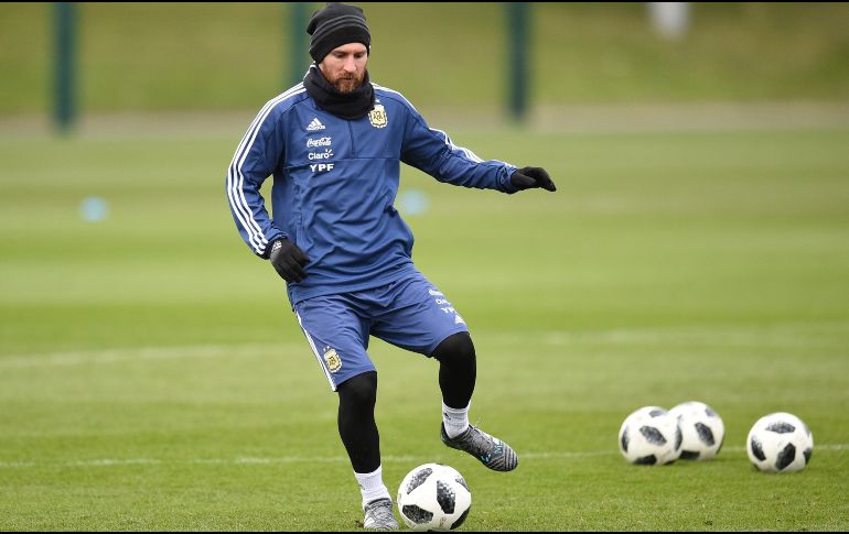 Ever Banega se perfila como el reemplazo de ''La Pulga'' en el Wanda Metropolitano para enfrentar a un conjunto español que ansía conseguir la victoria. AFP / G. Boyus