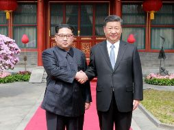 En un par de tuits matutinos, Trump dijo que el presidente chino Xi Jinping le contó que su reunión con Kim días atrás ''fue muy buena''. AFP /