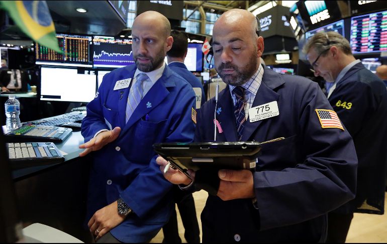 El NYSE Composite mostraba también un avance de 66.67 puntos al situarse en 12 mil 375.57 enteros. AP / ARCHIVO