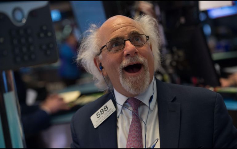A pesar de cerrar en positivo, Wall Street tuvo una jornada que comenzó indefinida. AFP / B. Smith