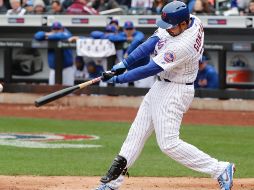 A su llegada a Nueva York, González afirmó que hablaría con el bat, y fue fiel a su palabra. AP/F. Franklin II