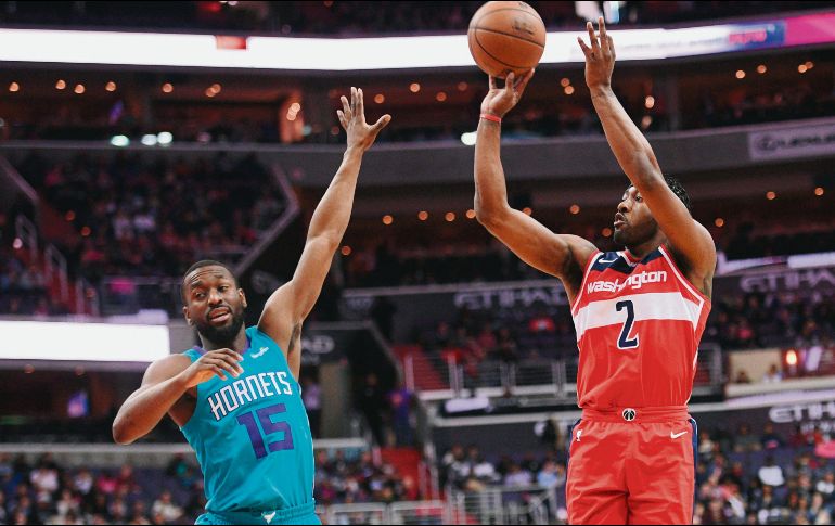 John Wall se perdió 27 partidos de esta temporada con los Wizards, además del Juego de Estrellas, tras haberse sometido a una cirugía de rodilla a finales de enero. Ayer reapareció y anotó 15 puntos para la victoria de su equipo. AP/N. Wass