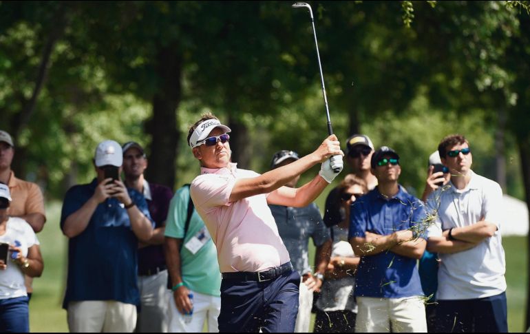 Animado. Ian Poulter firmó ayer una tarjeta de 65 golpes para igualar con 202 impactos a Beau Hossler en el liderato del Abierto de Houston. AP/E. Smith