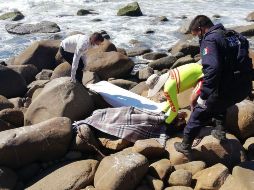Tras su desaparición, oficiales de la Unidad Estatal de Protección Civil y Bomberos en coordinación con autoridades municipales implementaron un operativo de búsqueda por tierra y mar. ESPECIAL/