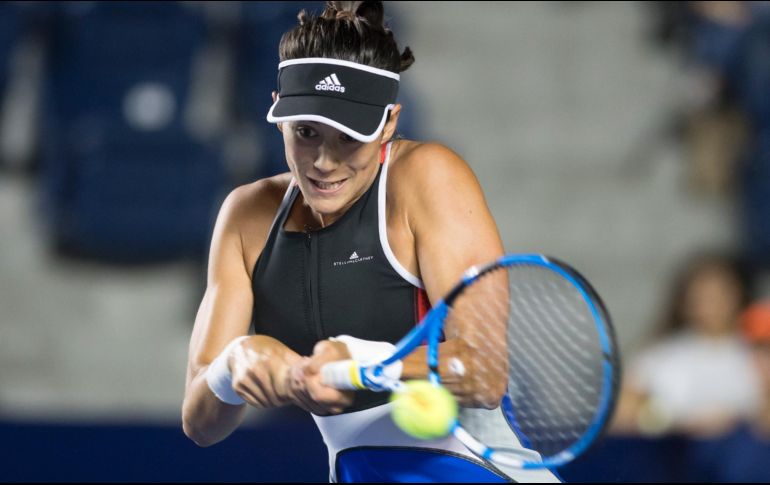 En una disertación de buen tenis con 18 tiros ganadores, Muguruza, tercera del ránking mundial, pasó a la siguiente ronda. EFE/M. Sierra