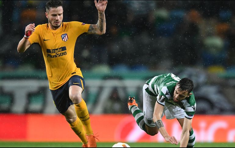 La primera parte fue un suplicio para el Atlético, que estuvo arrinconado en su área. AFP/F. Leong