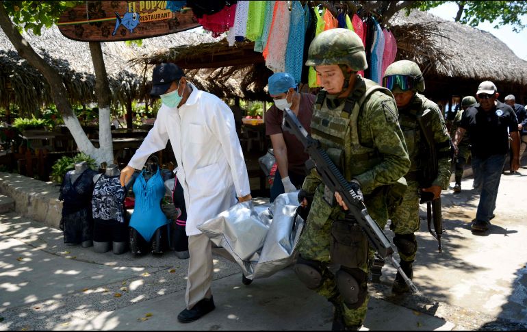 Por tal suceso, soldados y policías detuvieron a dos presuntos agresores. AFP / F. Robles