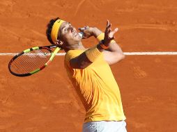 Rafa tendrá un rival duro este viernes, el austríaco Dominic Thiem, quien hoy eliminó al serbio Novak Djokovic. AFP / V. Hache