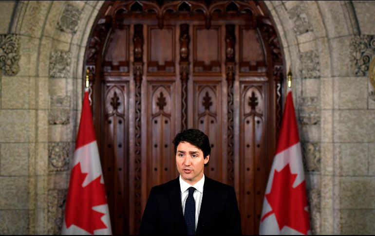 Trudeau añade que ''llevará tiempo'' entender las razones por las que el supuesto autor decidió arrollar ayer a decenas de personas en la principal avenida de Toronto. AP / J. Tang