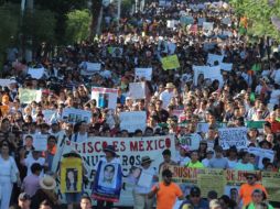 Entre ocho mil y doce mil personas marcharon por las calles de la ciudad en demanda de justicia para los desaparecidos en el Estado. EL INFORMADOR/E. Barrera