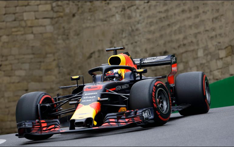 Ricciardo superó por un corto margen al finlandés Kimi Raikkonen, de Ferrari. AP/L. Bruno