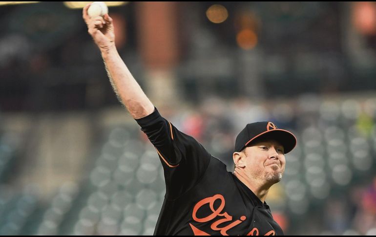 Chris Tillman. El abridor de los Orioles tuvo una destacada actuación en la lomita. AFP