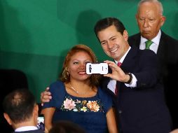 A quienes le preguntaron cuándo será México campeón del mundo en futbol, Peña respondió que en 2018. SUN / L. Godínez